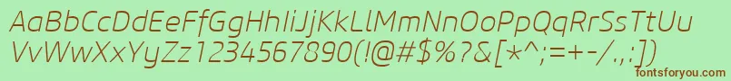 フォントCoreSansM25ExtralightItalic – 緑の背景に茶色のフォント