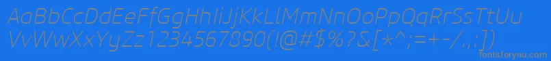 CoreSansM25ExtralightItalic-Schriftart – Graue Schriften auf blauem Hintergrund