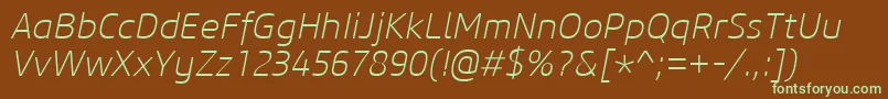 フォントCoreSansM25ExtralightItalic – 緑色の文字が茶色の背景にあります。