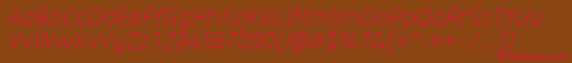 CoreSansM25ExtralightItalic Font – Red Fonts on Brown Background