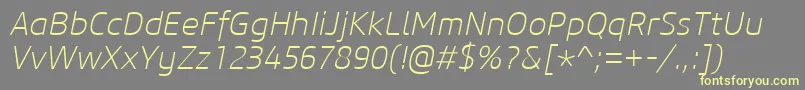 CoreSansM25ExtralightItalic-fontti – keltaiset fontit harmaalla taustalla