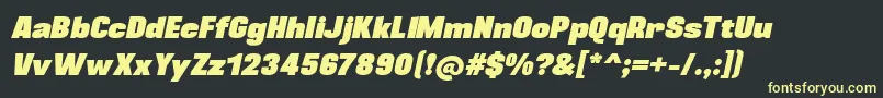 フォントBlackplotanItalic – 黒い背景に黄色の文字