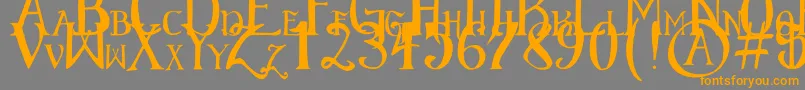 ElementaryGothicScaled-Schriftart – Orangefarbene Schriften auf grauem Hintergrund