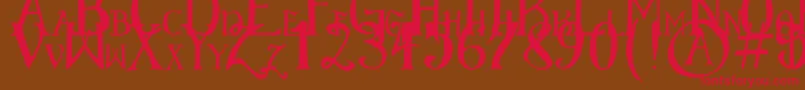 ElementaryGothicScaled-Schriftart – Rote Schriften auf braunem Hintergrund