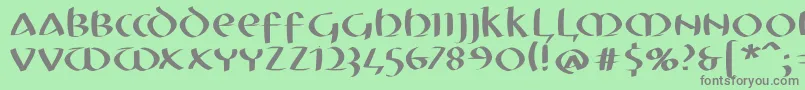 フォントMkuncialefs – 緑の背景に灰色の文字