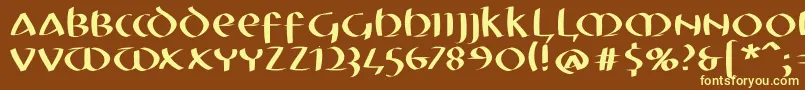 Mkuncialefs-fontti – keltaiset fontit ruskealla taustalla