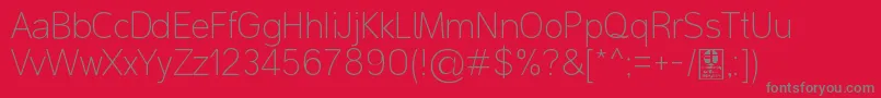 Police MalterSansThinDemo – polices grises sur fond rouge