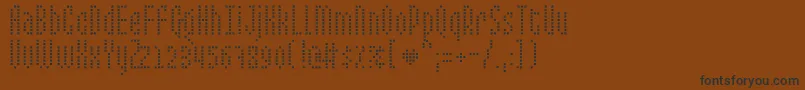 Czcionka MixelateIi – czarne czcionki na brązowym tle