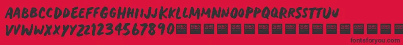Fonte HeavyTripDemo – fontes pretas em um fundo vermelho