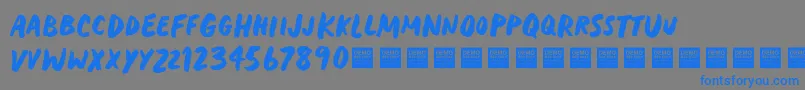 HeavyTripDemo-Schriftart – Blaue Schriften auf grauem Hintergrund