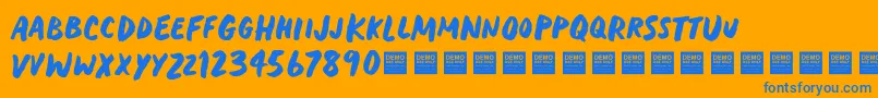 HeavyTripDemo-Schriftart – Blaue Schriften auf orangefarbenem Hintergrund