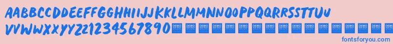 フォントHeavyTripDemo – ピンクの背景に青い文字