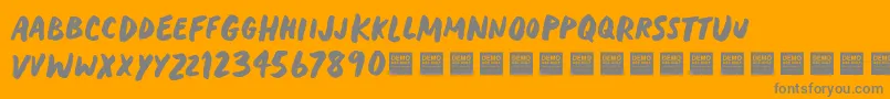 HeavyTripDemo Font – Gray Fonts on Orange Background