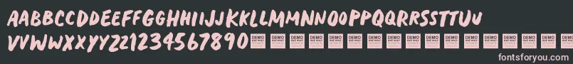 HeavyTripDemo Font – Pink Fonts on Black Background