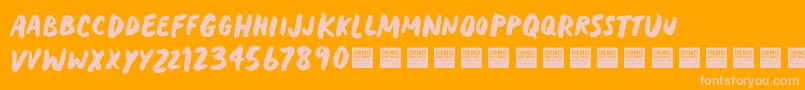HeavyTripDemo-Schriftart – Rosa Schriften auf orangefarbenem Hintergrund