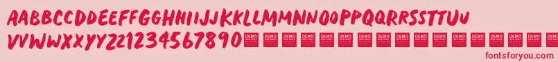 HeavyTripDemo Font – Red Fonts on Pink Background