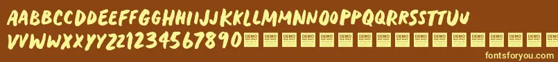 HeavyTripDemo Font – Yellow Fonts on Brown Background