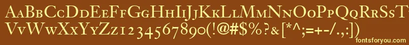 Czcionka JansonOldstyleSsiSmallCaps – żółte czcionki na brązowym tle