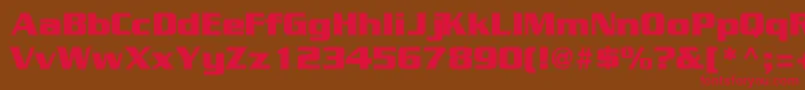 フォントGeodetdisplaysskRegular – 赤い文字が茶色の背景にあります。
