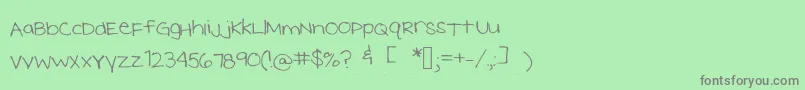 フォントMeghansfont2 – 緑の背景に灰色の文字