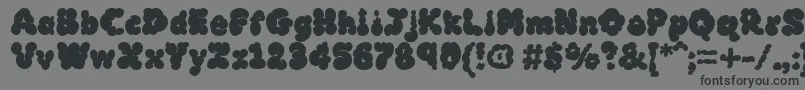 Mcklb Font – Black Fonts on Gray Background