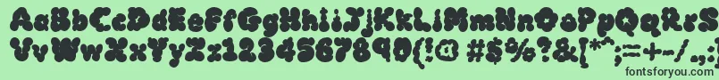 Mcklb Font – Black Fonts on Green Background