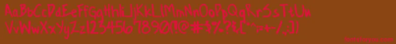 フォントConformityNormal – 赤い文字が茶色の背景にあります。