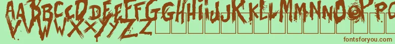 BatesShower-Schriftart – Braune Schriften auf grünem Hintergrund