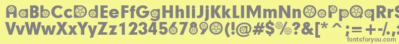 SatanicParticipants-fontti – harmaat kirjasimet keltaisella taustalla