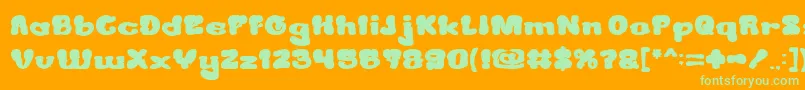 CreamyButterBold-Schriftart – Grüne Schriften auf orangefarbenem Hintergrund