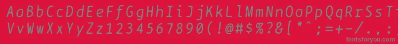 Czcionka Bptypewriteitalics – szare czcionki na czerwonym tle