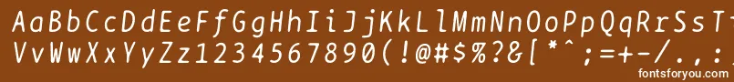 Czcionka Bptypewriteitalics – białe czcionki na brązowym tle