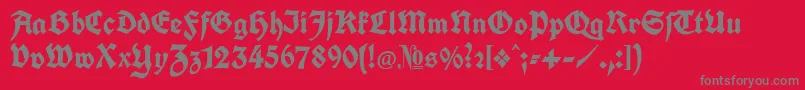 フォントKochFraktur – 赤い背景に灰色の文字