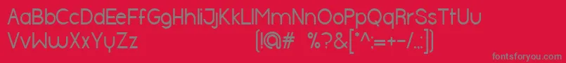 HalfmoonRegular-Schriftart – Graue Schriften auf rotem Hintergrund