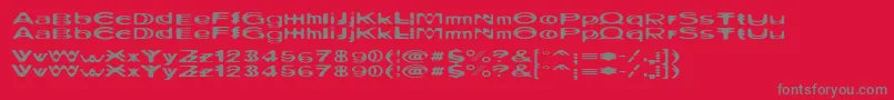 フォントRitualthree – 赤い背景に灰色の文字