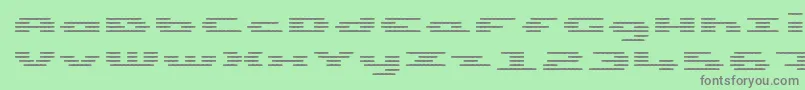 UpTinyLcdFourDecohLight-Schriftart – Graue Schriften auf grünem Hintergrund