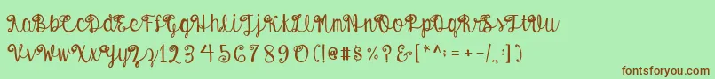 AustieBostEnvelopes-fontti – ruskeat fontit vihreällä taustalla
