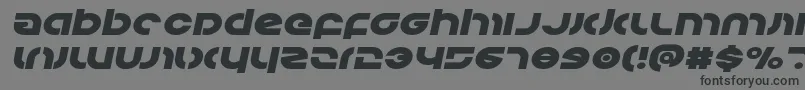 フォントKovacsexpandital – 黒い文字の灰色の背景