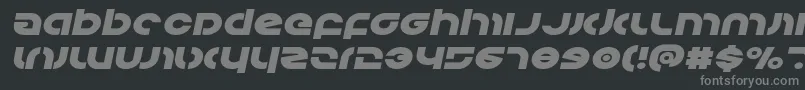Kovacsexpandital-fontti – harmaat kirjasimet mustalla taustalla