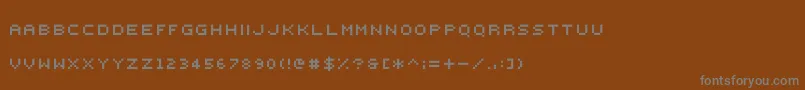 Czcionka 000webfont – szare czcionki na brązowym tle