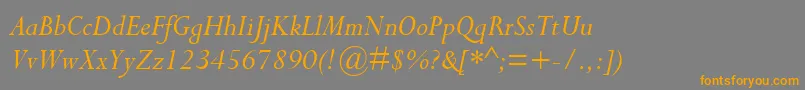 CompleatSsiItalic-fontti – oranssit fontit harmaalla taustalla