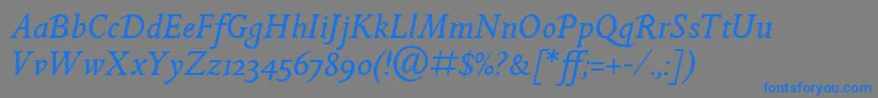 GoldenCockerelItcItalic-Schriftart – Blaue Schriften auf grauem Hintergrund