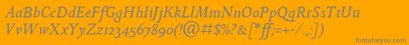 GoldenCockerelItcItalic-Schriftart – Graue Schriften auf orangefarbenem Hintergrund