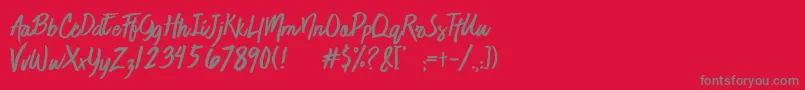 JaimeBlues-Schriftart – Graue Schriften auf rotem Hintergrund