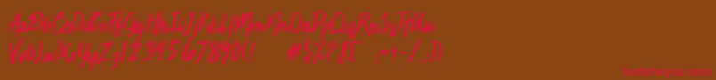 JaimeBlues-Schriftart – Rote Schriften auf braunem Hintergrund