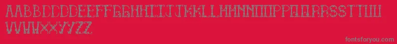 Limitless-Schriftart – Graue Schriften auf rotem Hintergrund