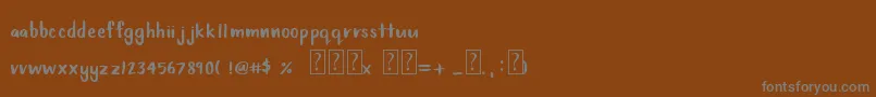 Czcionka Babyfox – szare czcionki na brązowym tle