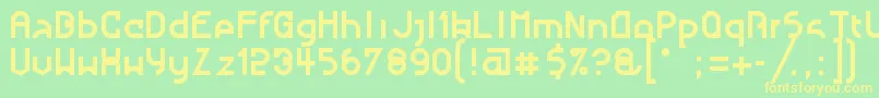 NougatineRegular Font – Yellow Fonts on Green Background