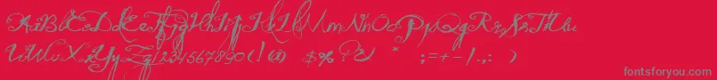 Czcionka QuiltedButterfly – szare czcionki na czerwonym tle