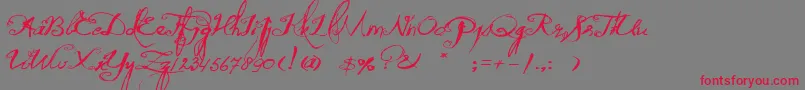 フォントQuiltedButterfly – 赤い文字の灰色の背景